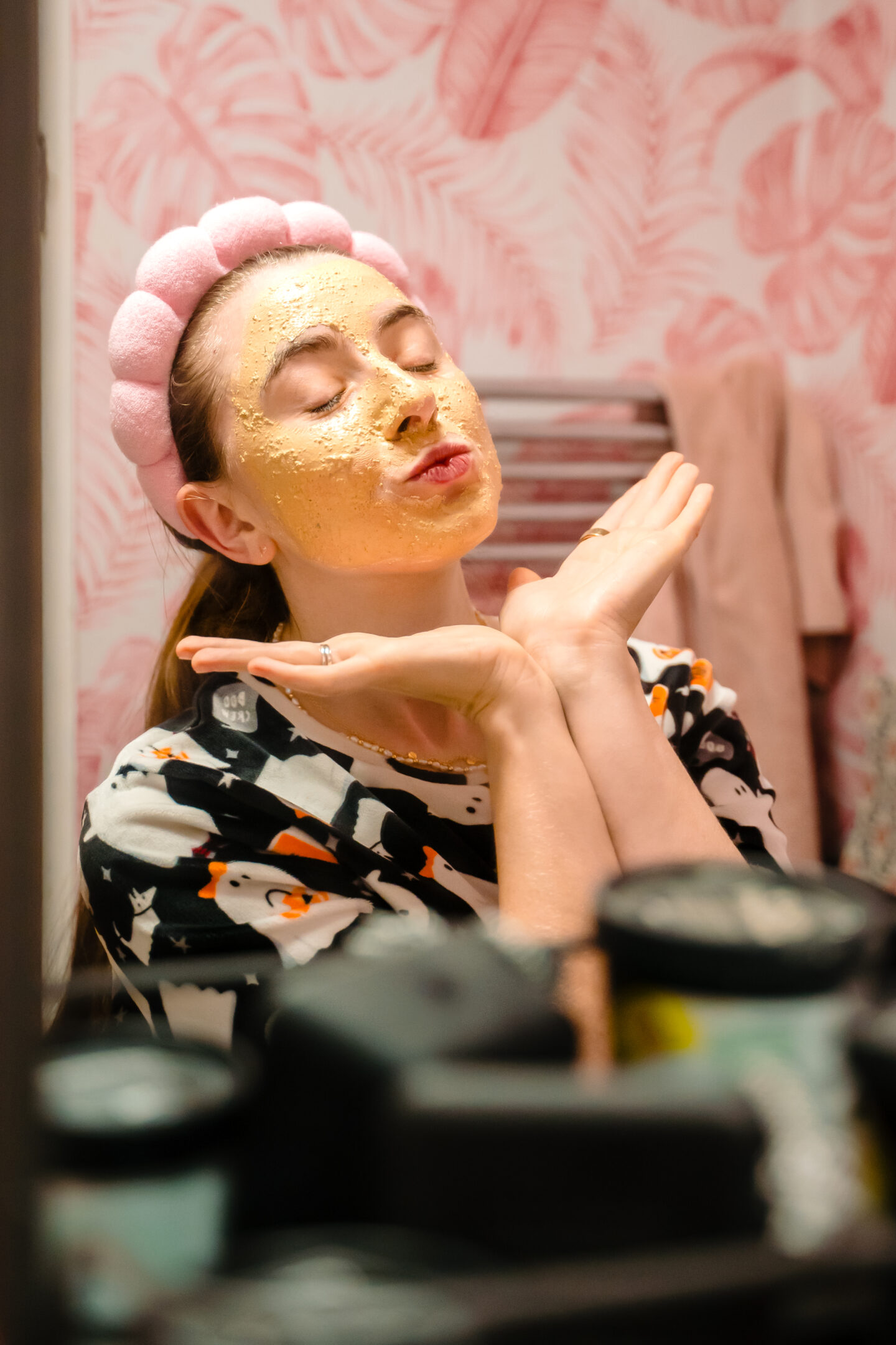 Person posing in a stylish bathroom. Lush Fresh & Flowers